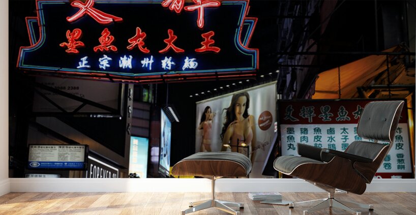 Neon signs light up a busy street in Hong Kong at night Wall Murals