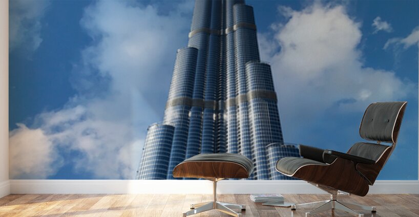 Burj Khalifa stands tall against a blue sky in Dubai UAE Wall Murals