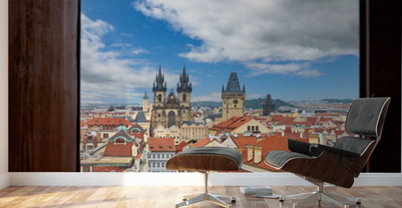 Prague cityscape from window Tyn Church red roofs. Wall Murals