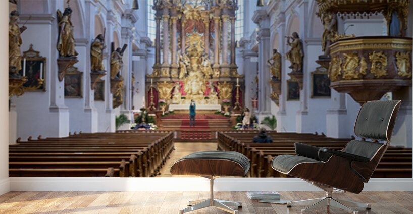 People explore the interior of St Wall Murals