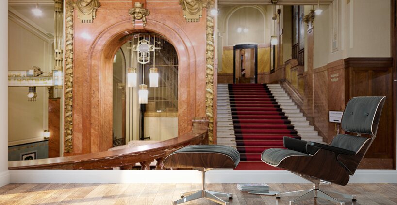 Elegant interior with red carpeted staircase and ornate gold det Wall Murals
