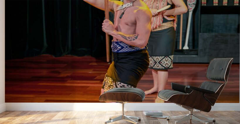 Two performers present a Maori haka dance in Auckland Wall Murals