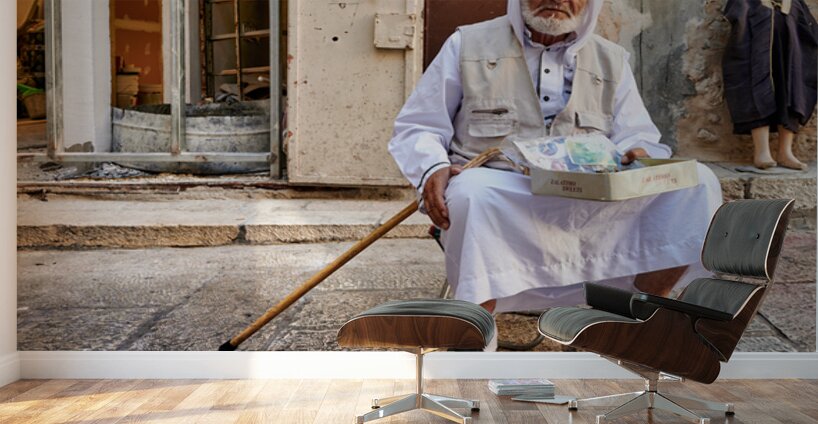 Old man sits in the old city of Jerusalem asking for help Wall Murals