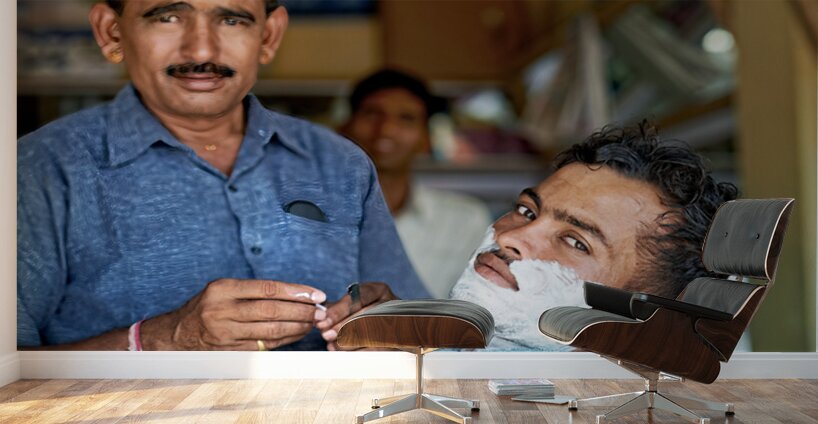 Barber at work in Khimsar Rajasthan India during a busy day Wall Murals