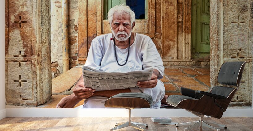 Man reads newspaper on street in Jaisalmer Rajasthan India Wall Murals
