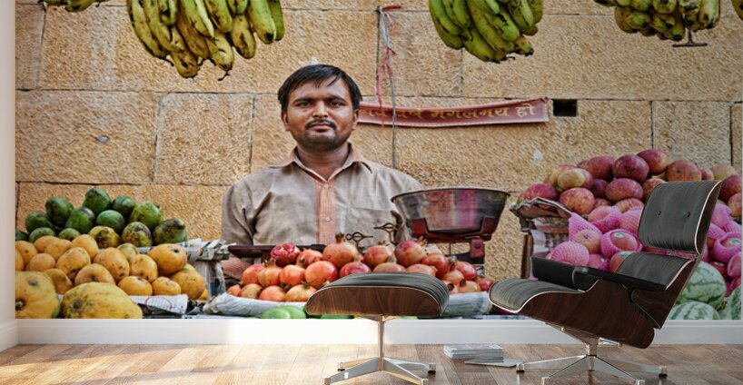 Fruits and vegetables stall in Jaisalmer with vendor at work Wall Murals