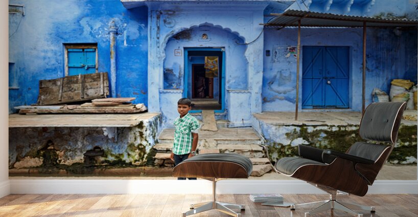 Decorated painted house in Bundi with a boy standing outside Wall Murals