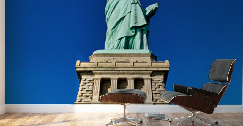 Statue of Liberty stands proudly on Liberty Island in Manhattan Wall Murals