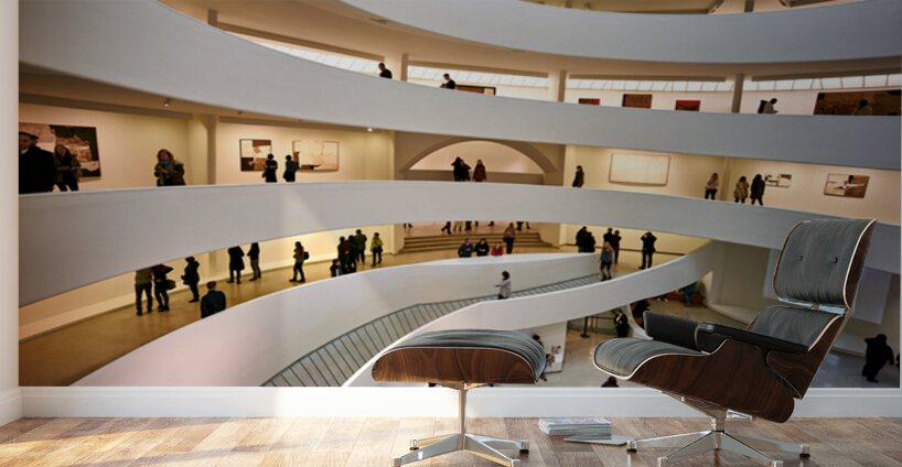 People walk through the spiraled structure of Solomon R Wall Murals