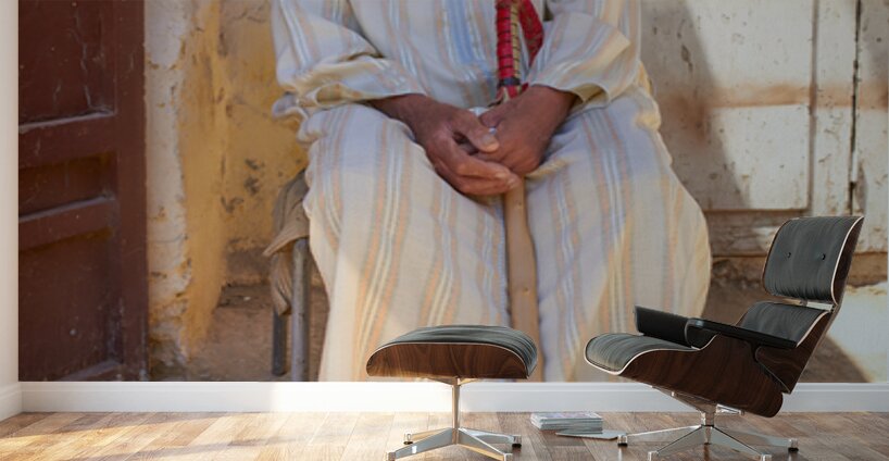 Old man sitting in Meknes Morocco in daylight Wall Murals