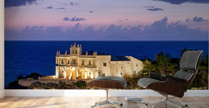 Tropea offers views of the sea and buildings at sunset in Calabr Wall Murals