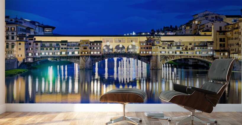 Ponte Vecchio bridge in Florence under evening sky over river Ar Wall Murals