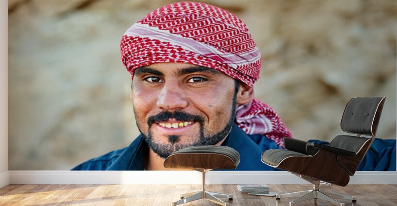 Young man in Syria smiles during a sunny day outdoors Wall Murals