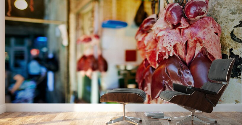 Butcher displays meat at souq in Aleppo Syria during the day Wall Murals