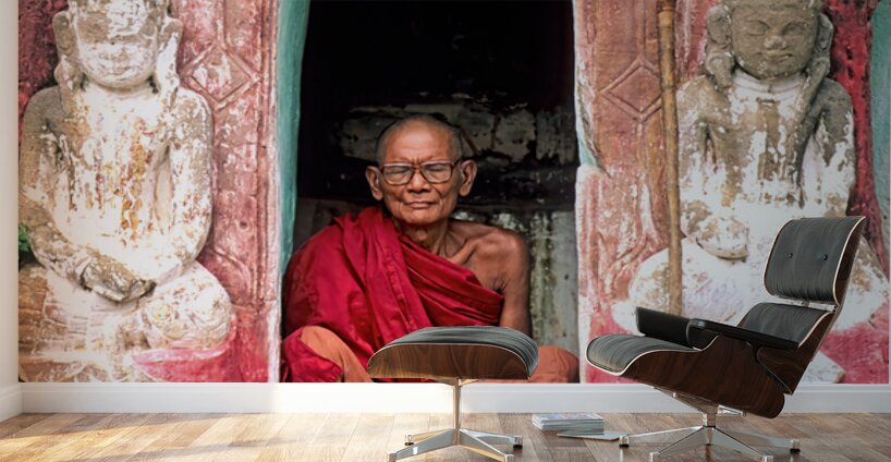 Old monk meditates in temple doorway in Myanmar Wall Murals