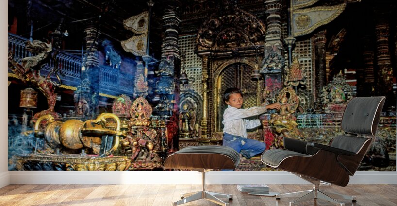 Boy interacts with religious artifacts in Kathmandu temple Wall Murals