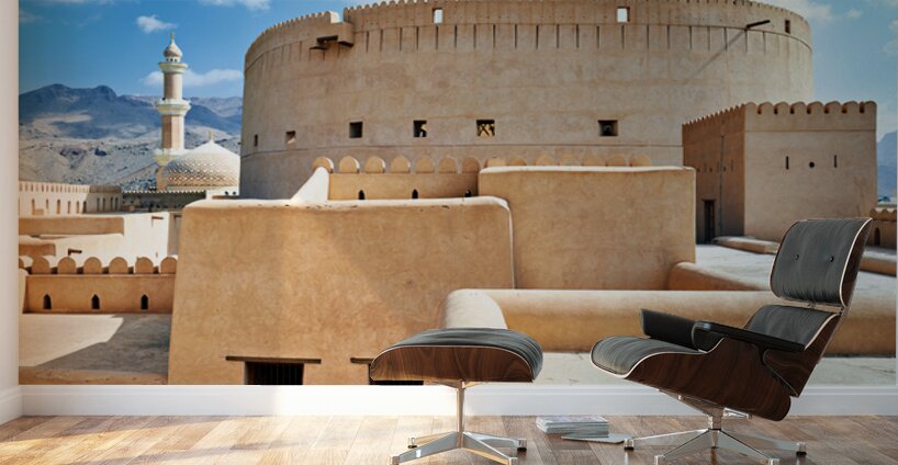 Visitors explore Nizwa Fort a historic site in Oman Wall Murals