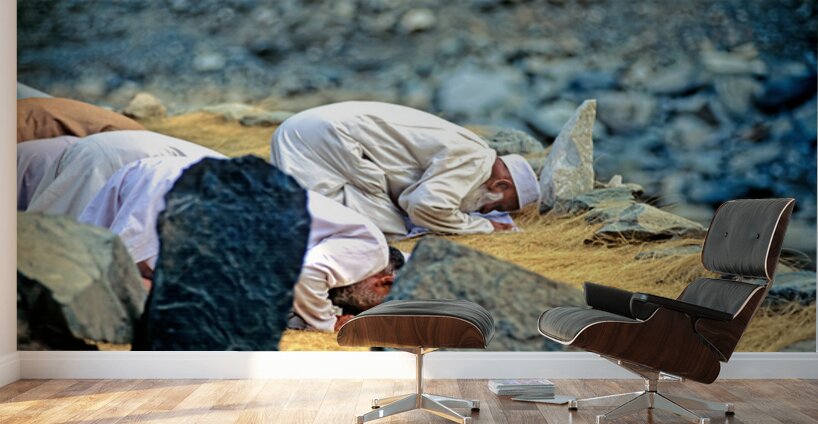 Muslim men pray towards Mecca in Pakistan during prayer time Wall Murals