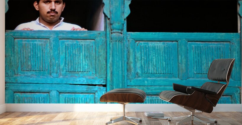 Man looks out from window in Lahore Pakistan Wall Murals