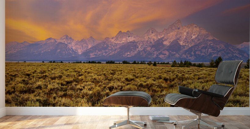 Hikers explore view of Grand Teton mountains at sunset Wall Murals