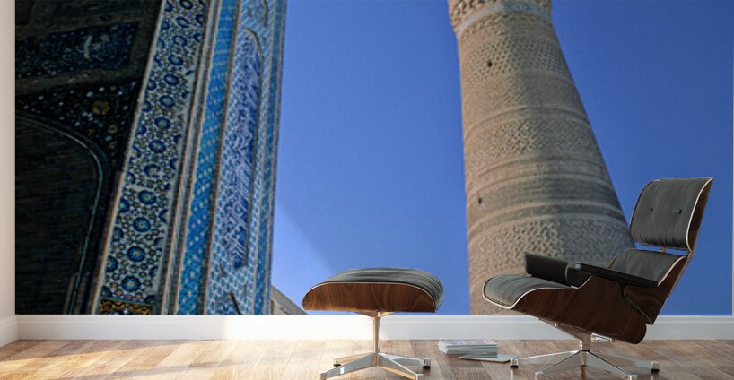 People rest near the tall minaret in Khiva Uzbekistan Wall Murals
