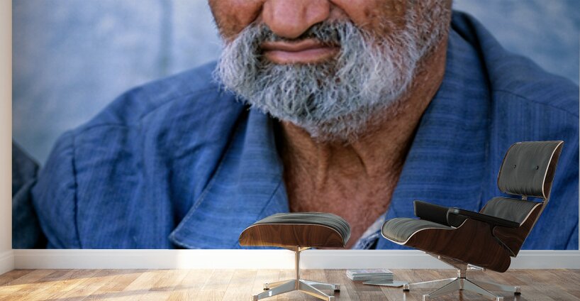 Elderly man in Bukhara Uzbekistan engages in local culture Wall Murals