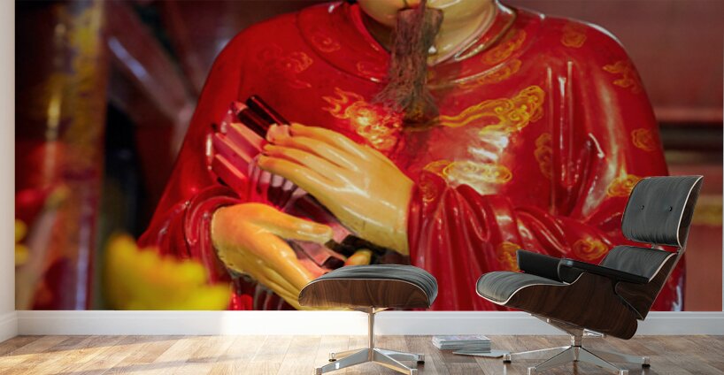 Statue of a deity in Hanoi Vietnam showing traditional clothing Wall Murals