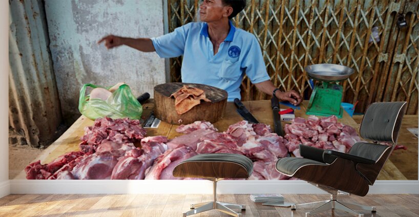 Local butcher selling meat in Phu Quoc market area Wall Murals