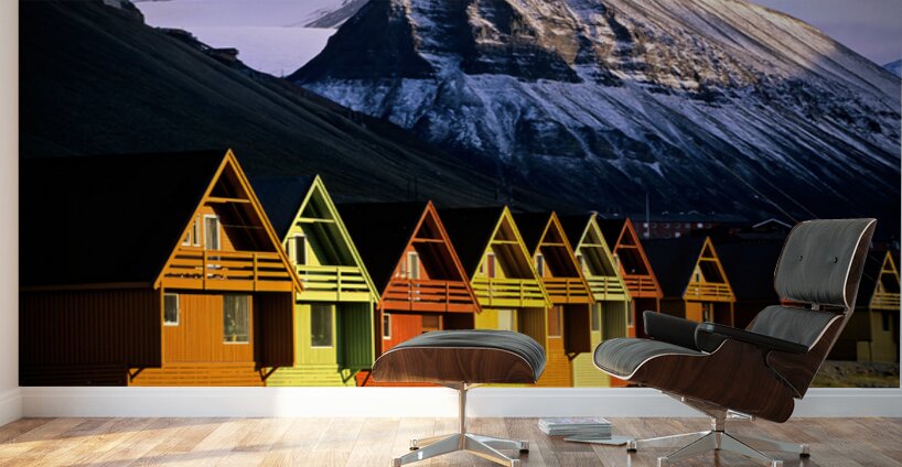 Colorful cabins in Longyearbyen Svalbard near snowy mountains Wall Murals