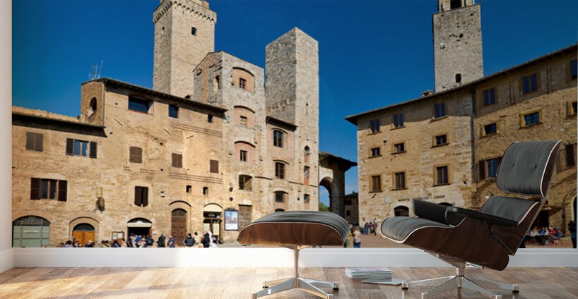 Visitors explore Piazza della Cisterna in San Gimignano Wall Murals