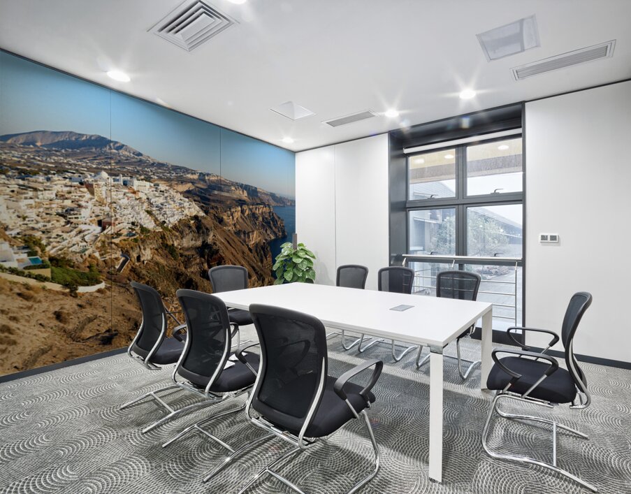 Santorinis white buildings on caldera cliffs above the sea. Wall Printing