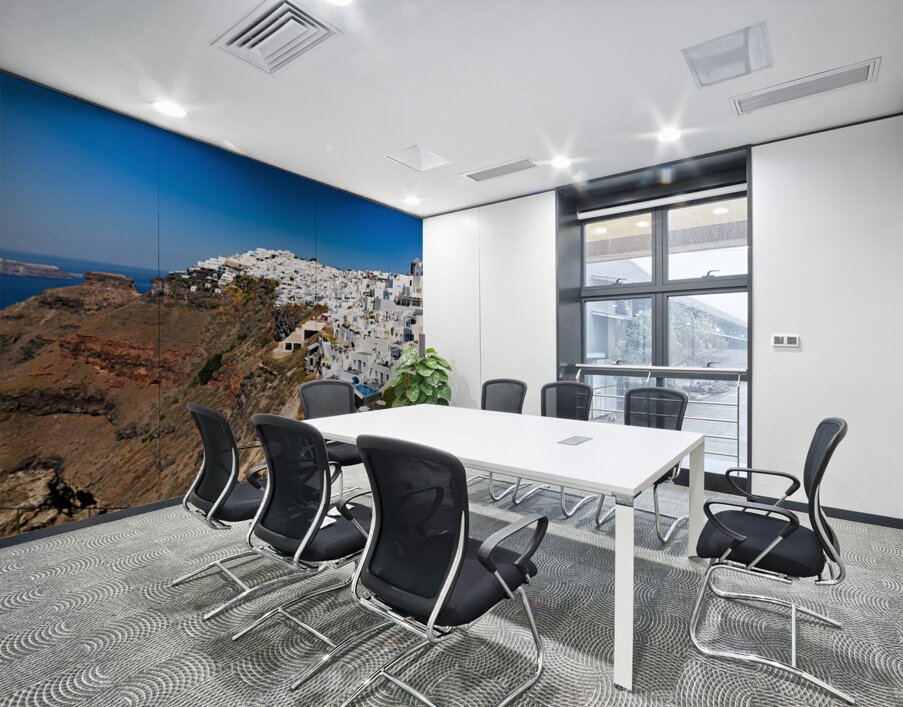 Santorini: White cliffside village blue sea clear sky. Wall Printing