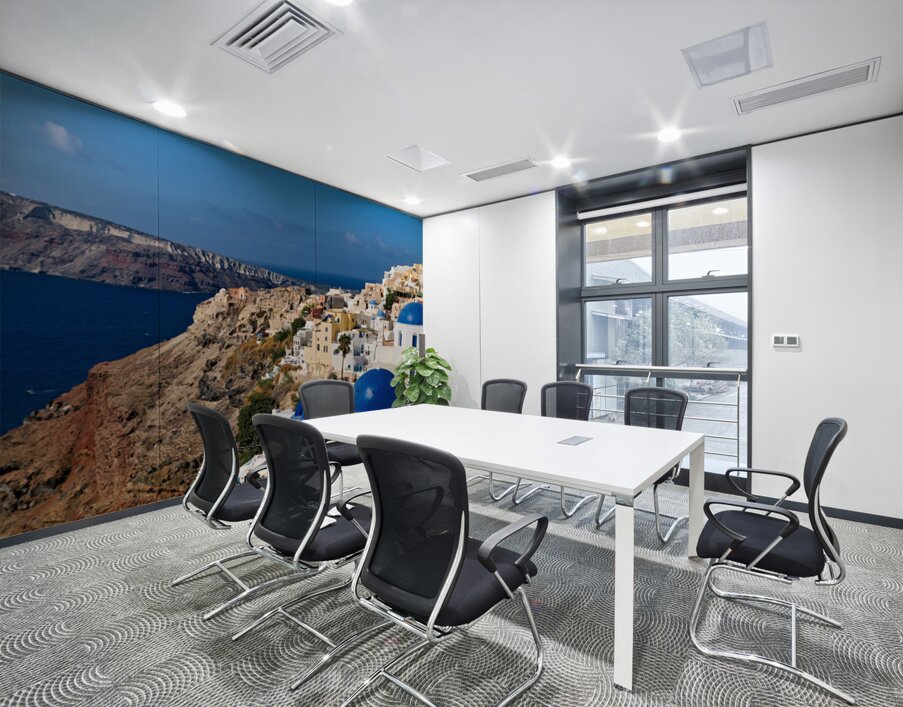 Santorinis iconic white buildings and blue domes overlooking th Wall Printing