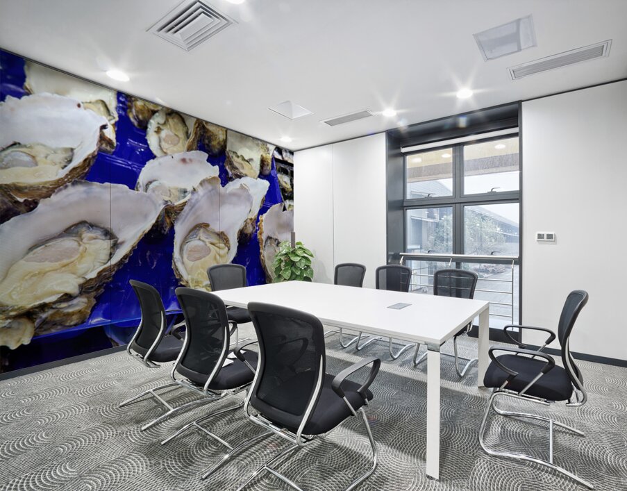 Freshly shucked oysters on blue plastic trays. Wall Printing
