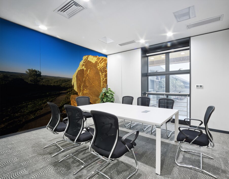 Carved stone monument in the Australian outback at sunset. Wall Printing