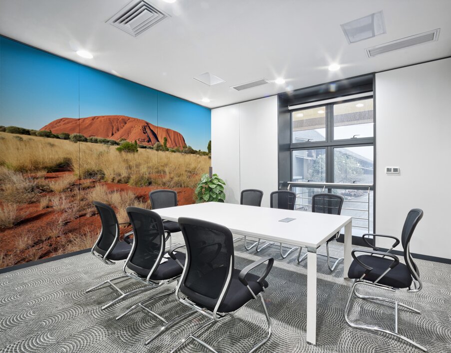 Uluru Australias iconic sandstone monolith under a clear blue Wall Printing