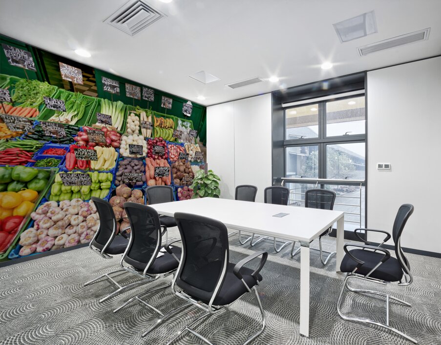 Colorful fresh vegetables and fruits displayed at a market stall Wall Printing