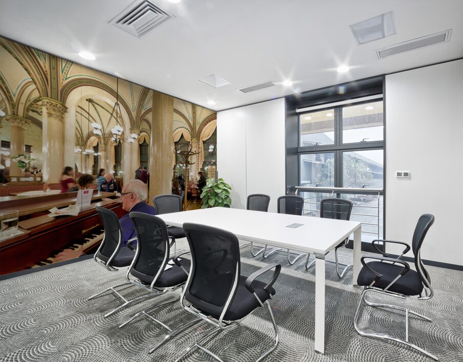 Man playing piano in an ornate bustling cafe. Wall Printing