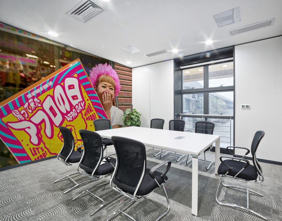 Lolita girl holds sign in Shibuya District of Tokyo during Afro  Wall Printing