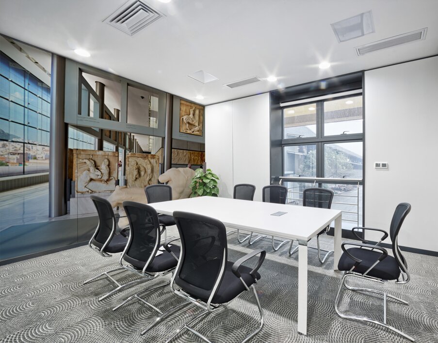 Visitors explore sculptures at Acropolis Museum in Athens Greece Wall Printing