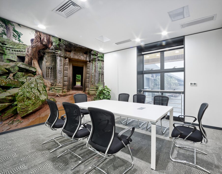 Ancient temple ruins overgrown by trees and moss. Wall Printing