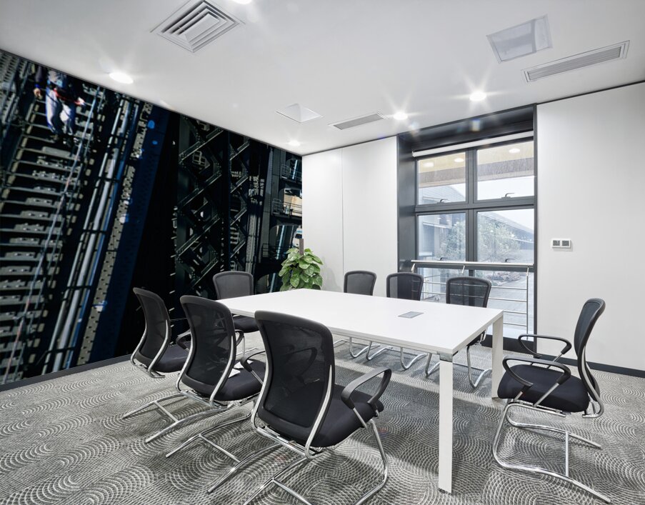 Man walks on bridge with cars below Wall Printing