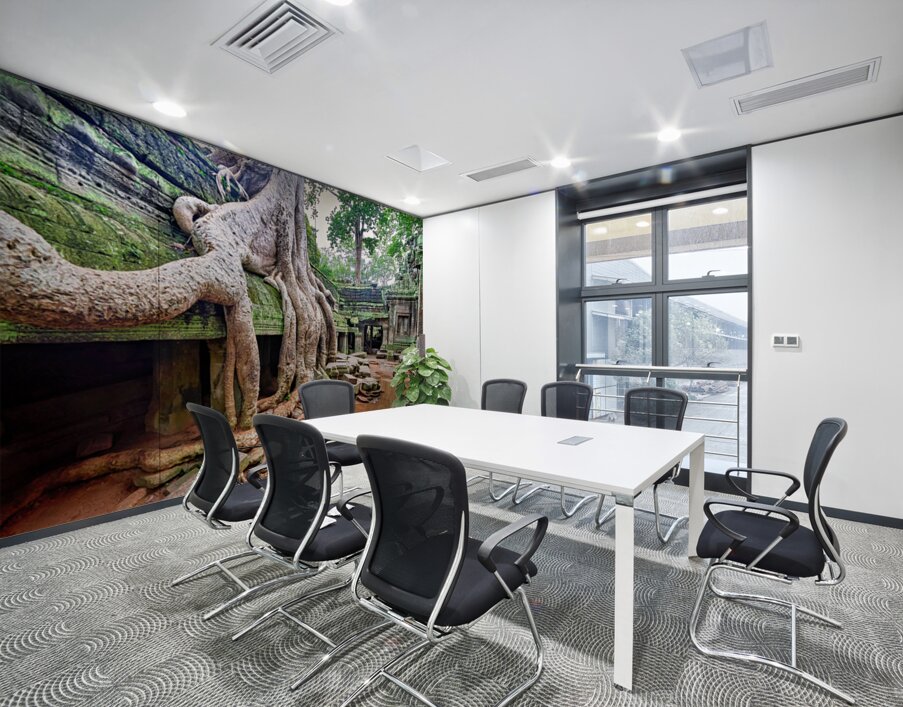 Massive tree roots engulfing ancient moss covered temple ruins. Wall Printing