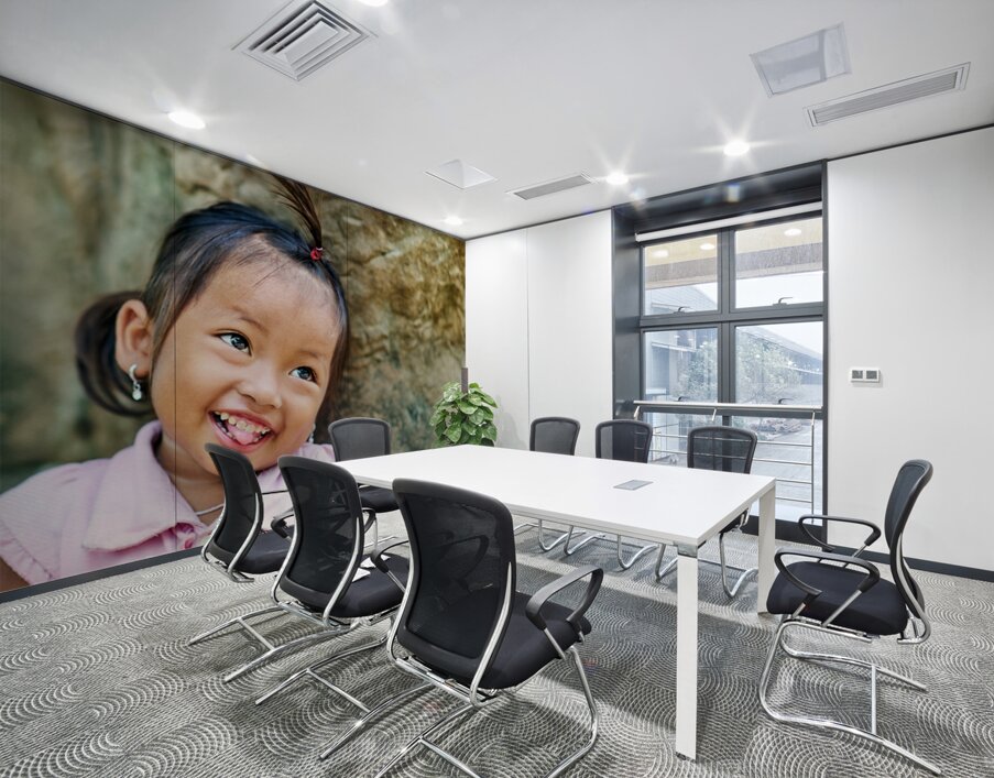 Joyful young girl with a playful smile and tongue out. Wall Printing