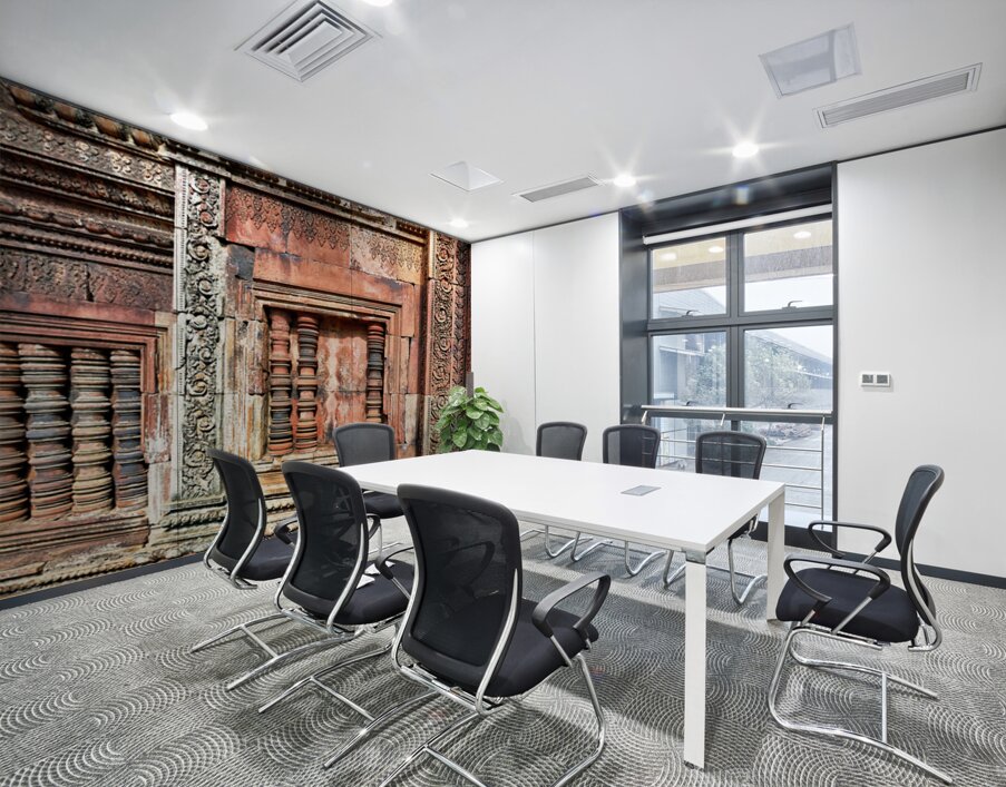 Ancient temple wall with intricate reddish stone carvings and co Wall Printing