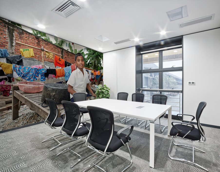 Boy with food tray clothes drying in background. Wall Printing