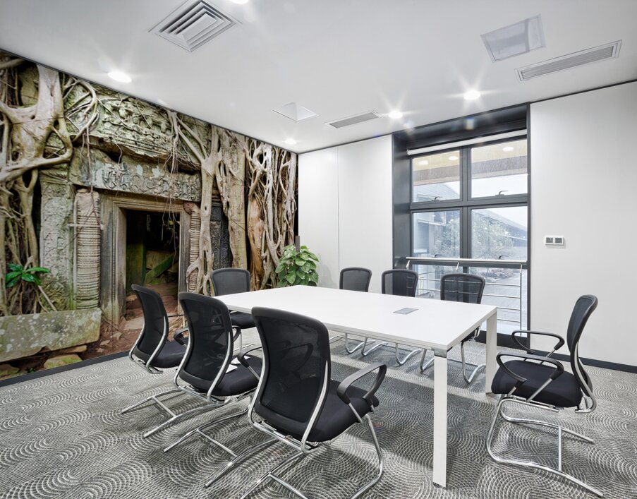Ancient temple ruins consumed by massive tree roots. Wall Printing
