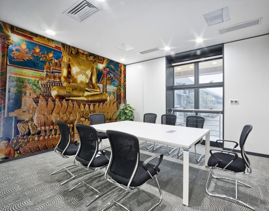 Ornate golden Buddha statue in a richly decorated temple. Wall Printing