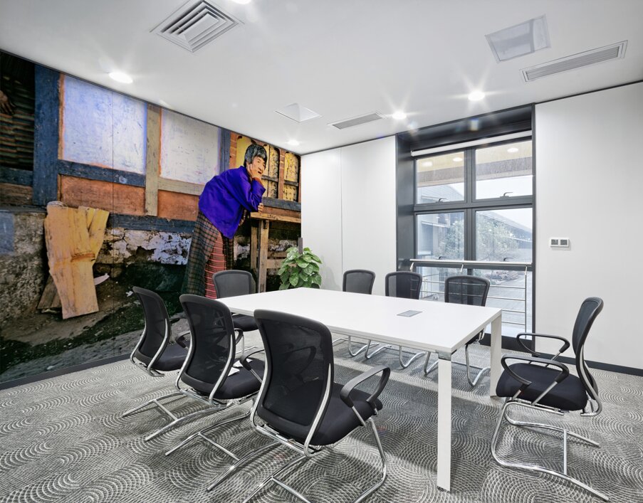 Smiling elderly woman in traditional dress leaning on wooden tab Wall Printing