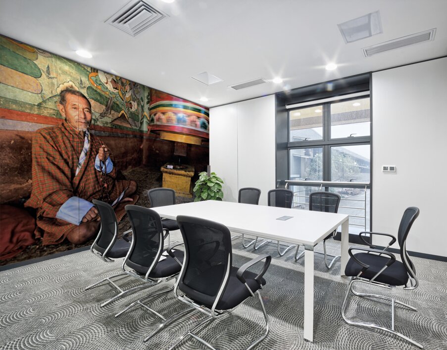 Bhutanese man with prayer beads and spinning prayer wheel. Wall Printing